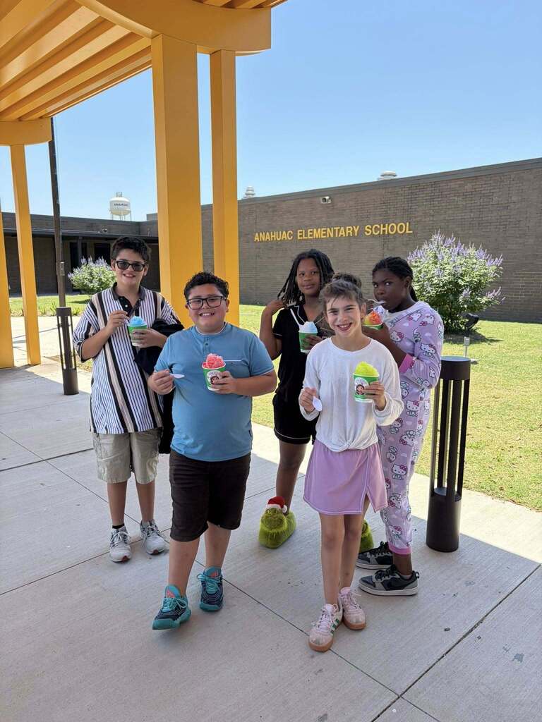 Students enjoying snowcones. 