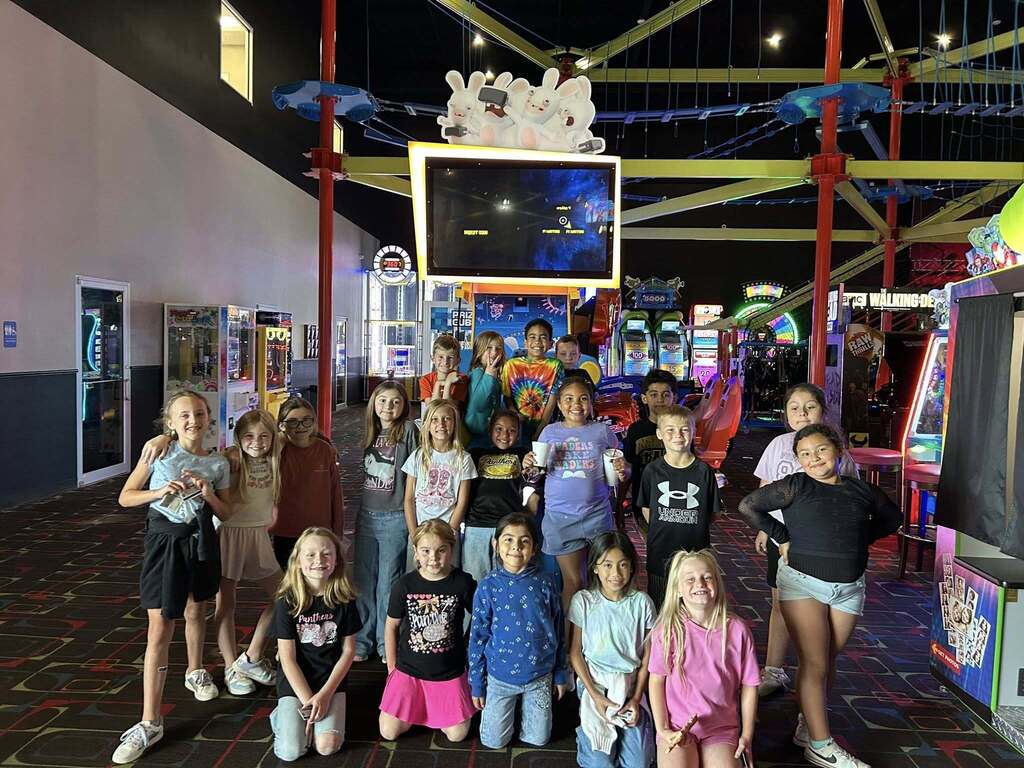 Kids on a field trip to bowling alley