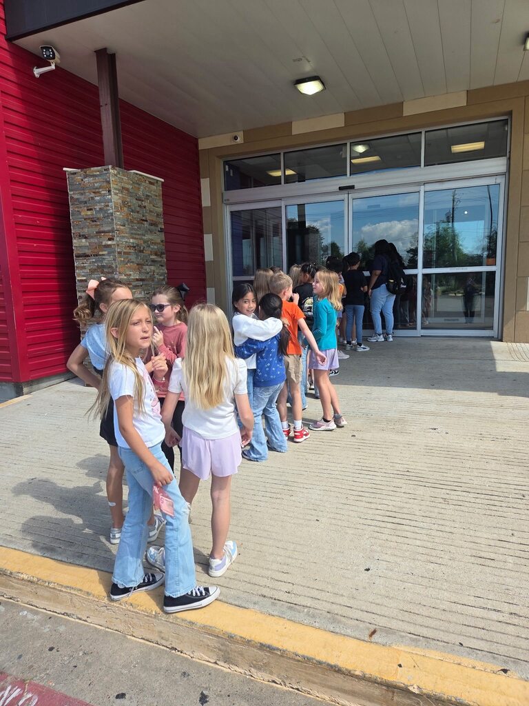 Kids on a field trip to bowling alley