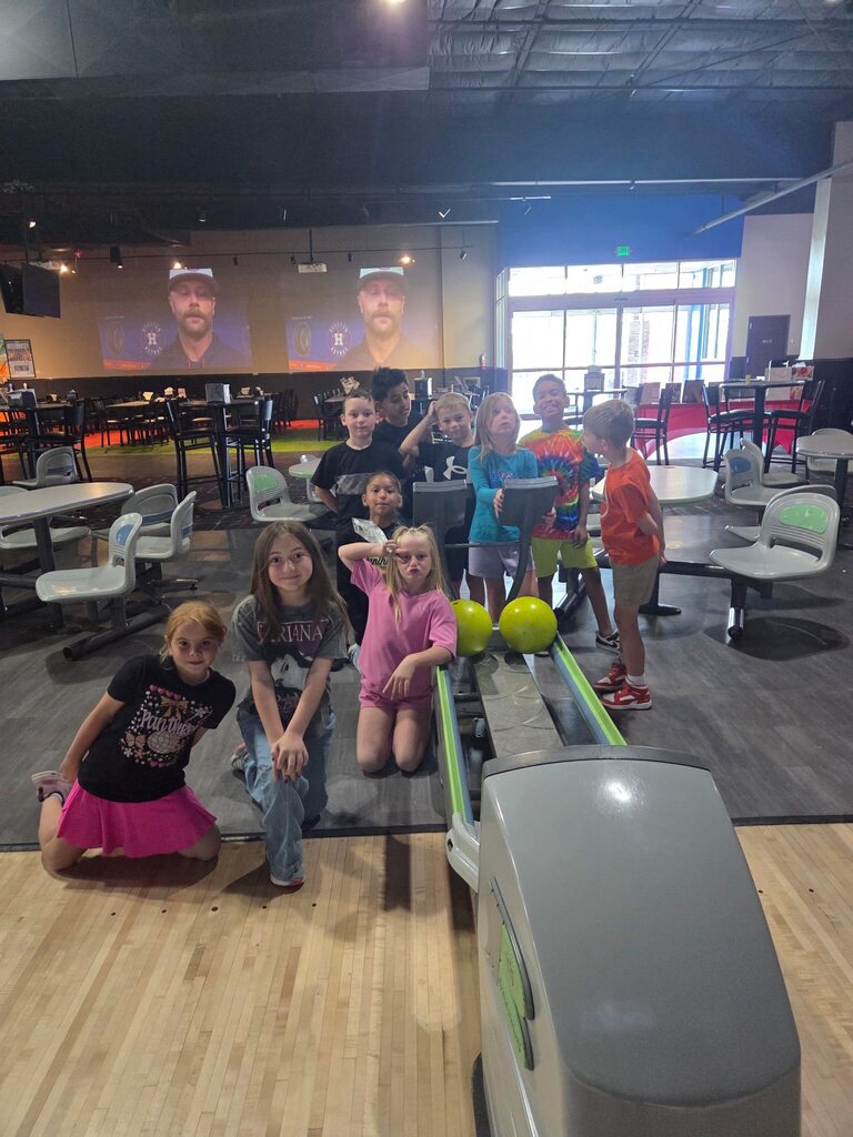 Kids on a field trip to bowling alley