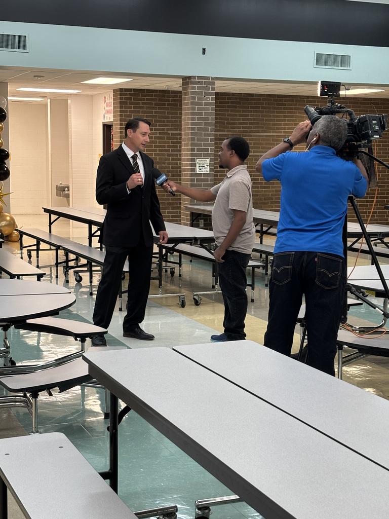 Dr. Walker, Derrick Jones and his camera man.
