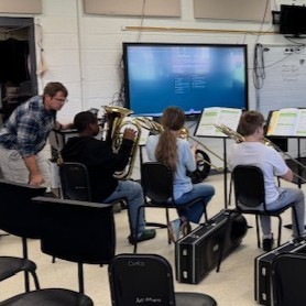 The 7th grade band is hard at work fine-tuning the little things—tone and musicianship