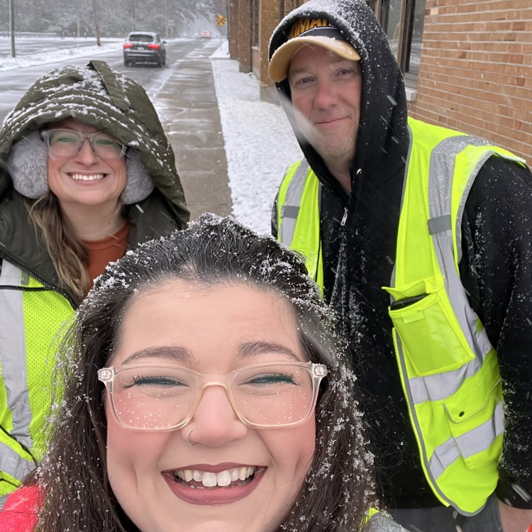 teachers standing in the snow