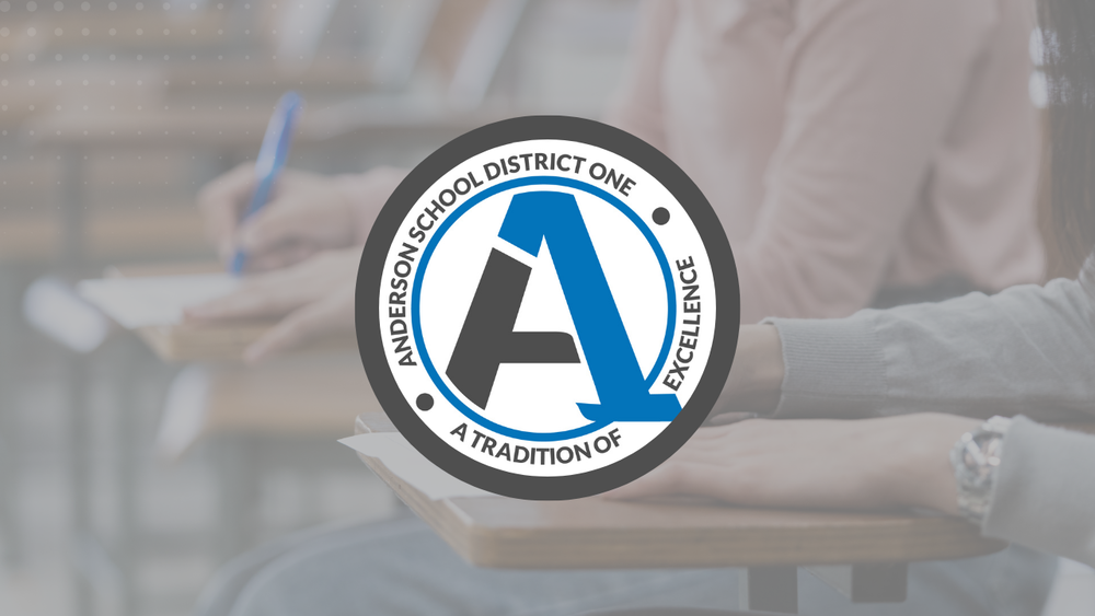 A photo of students writing at their desks and the school district logo over it