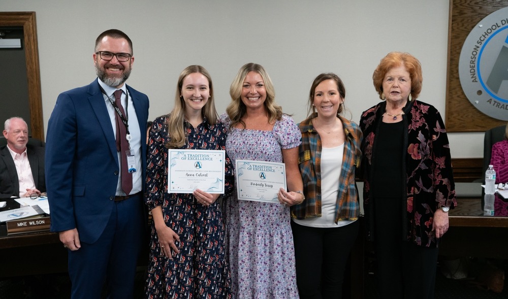 The Anderson One Superintendent and Board Chair Nancy Upton pose for a photo with the Employees of the Year: Kimberly Terry, Holly Ragsdale, and Anna Calvert