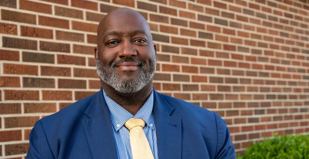 A headshot photo of Daniel Bruce, the new principal of Wren High School