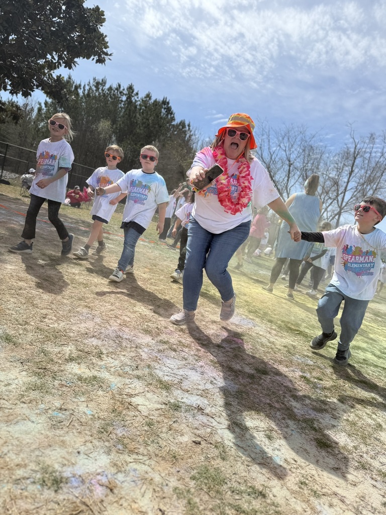 Mrs. Alexander running with 1st grade