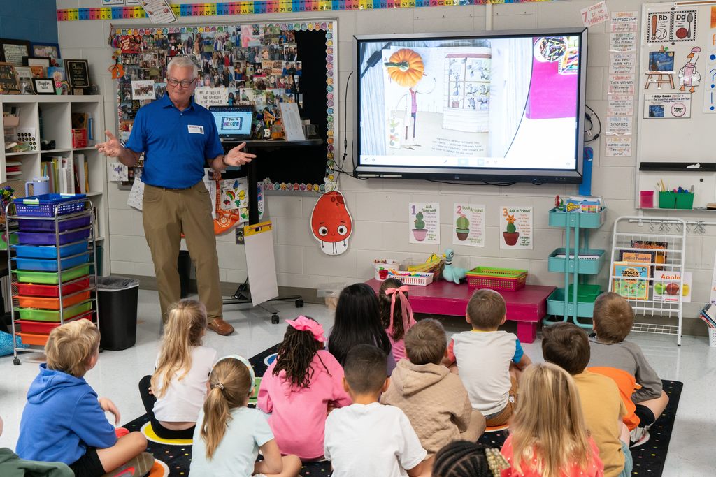 Real Men Read - students engaged with Mr. Brady