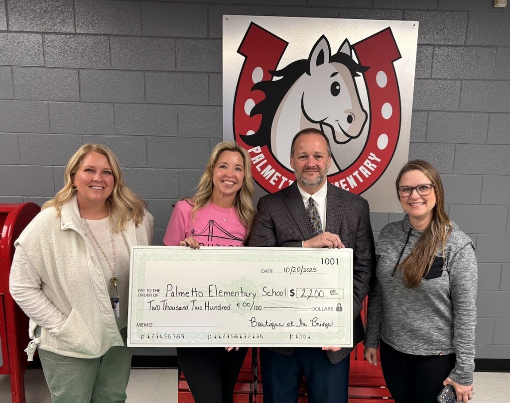 Boutique at the Bridge check presentation