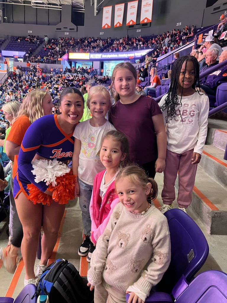 1st grade girls with Clemson cheerleader