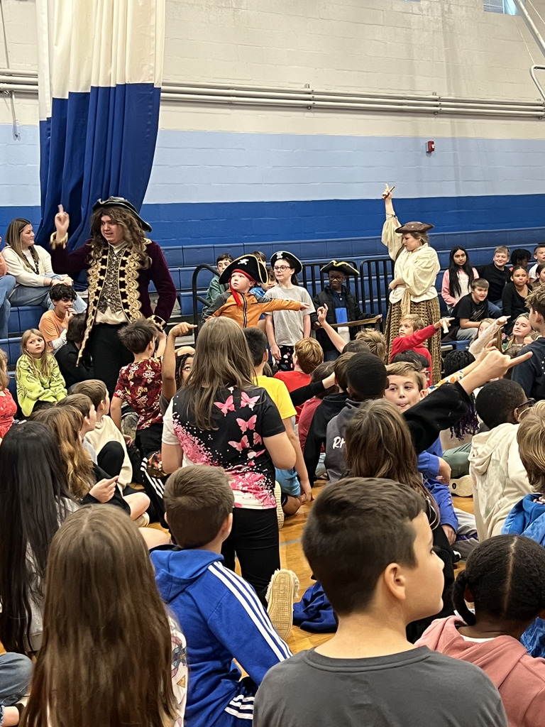group photo during performance - some students pointing