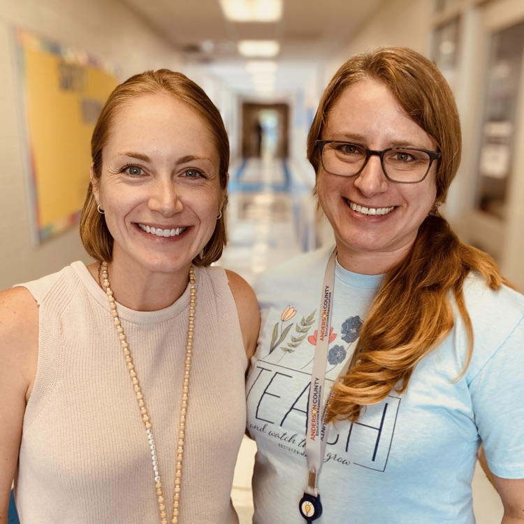 Mrs. Brown and Mrs. Cooper in the hallway 