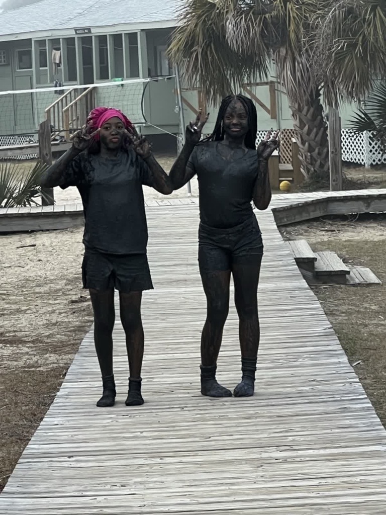 Post mudpit picture of 2 girls