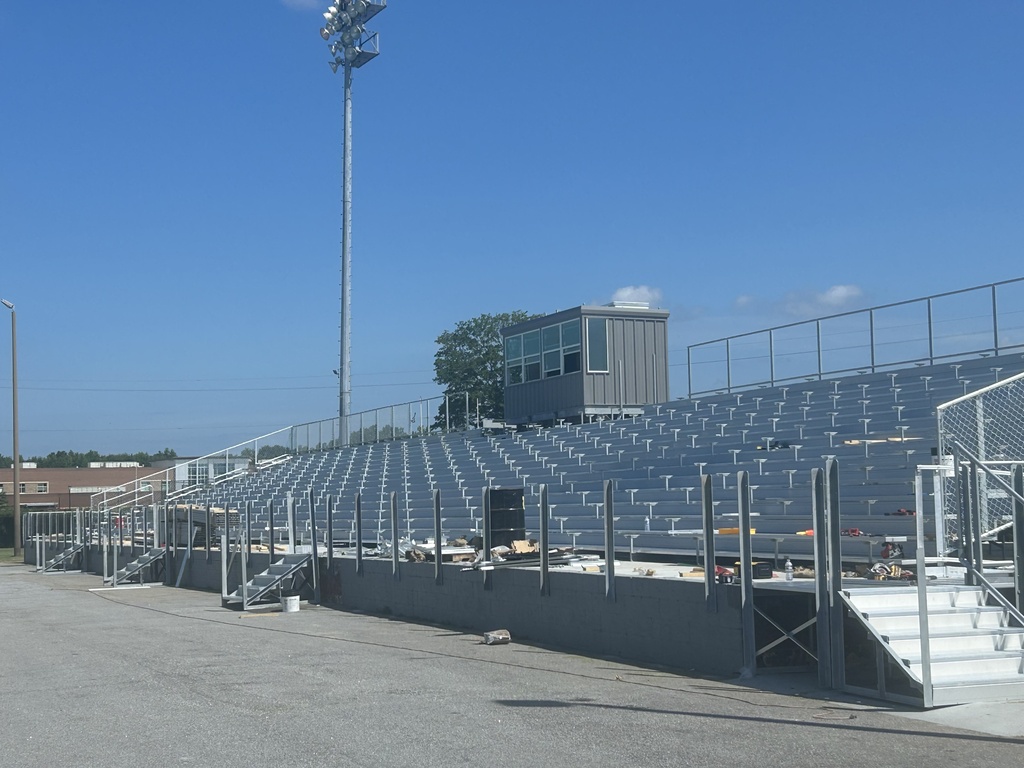 The visitors section of the Palmetto High School football stadium being upgraded. It shows the new bleachers and press box