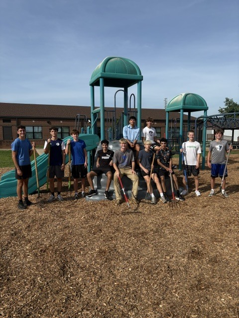 PVHS Soccer Team helps spread mulch at PVES