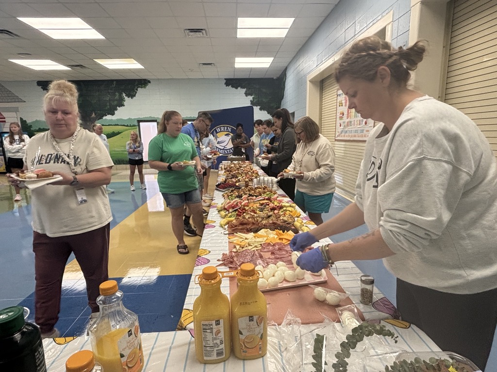 Teachers getting breakfast provided by PTO