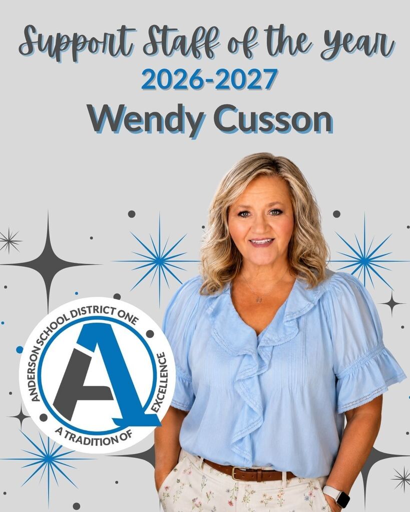 A banner of a staff member that says Support Staff of the Year 2026-2027 Wendy Cusson