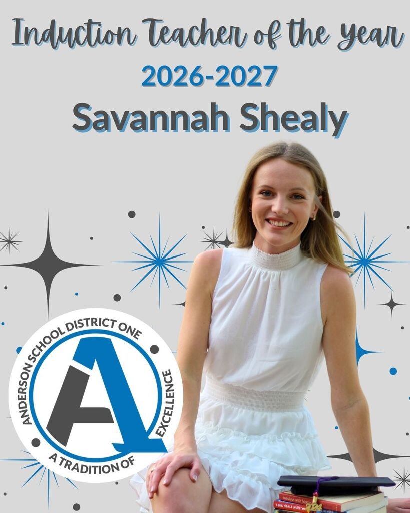 A banner of a staff member that says Induction Teacher of the Year 2026-2027 Savannah Shealy