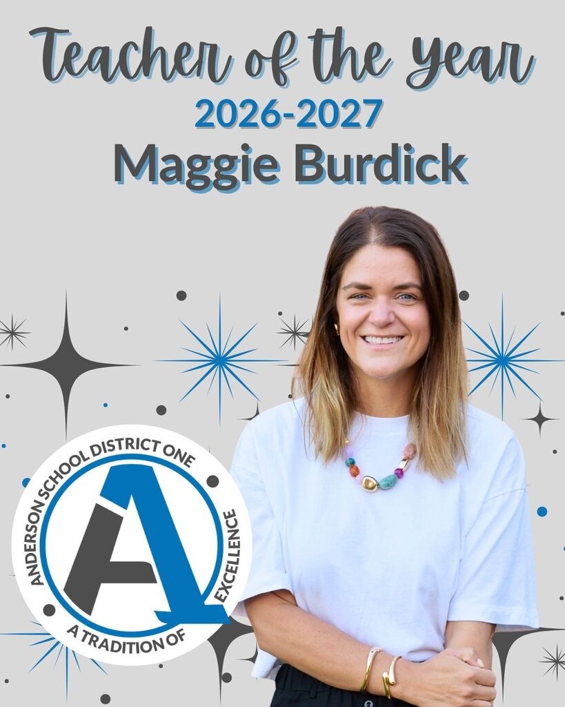 A banner of a staff member that says Teacher of the Year 2026-2027 Maggie Burdick