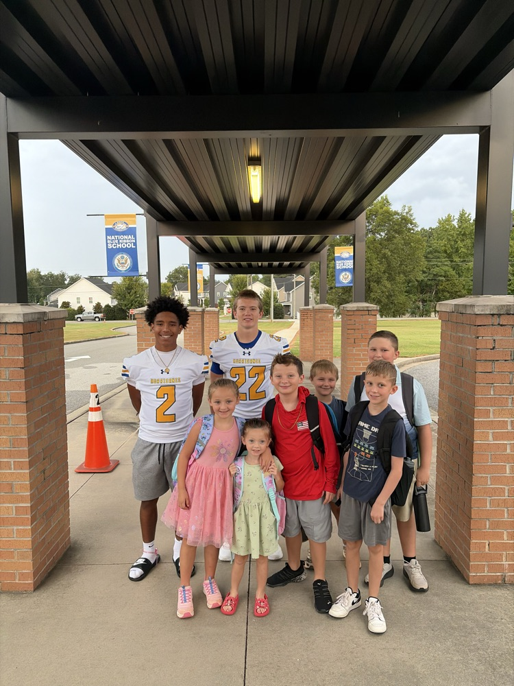 students with WHS football players