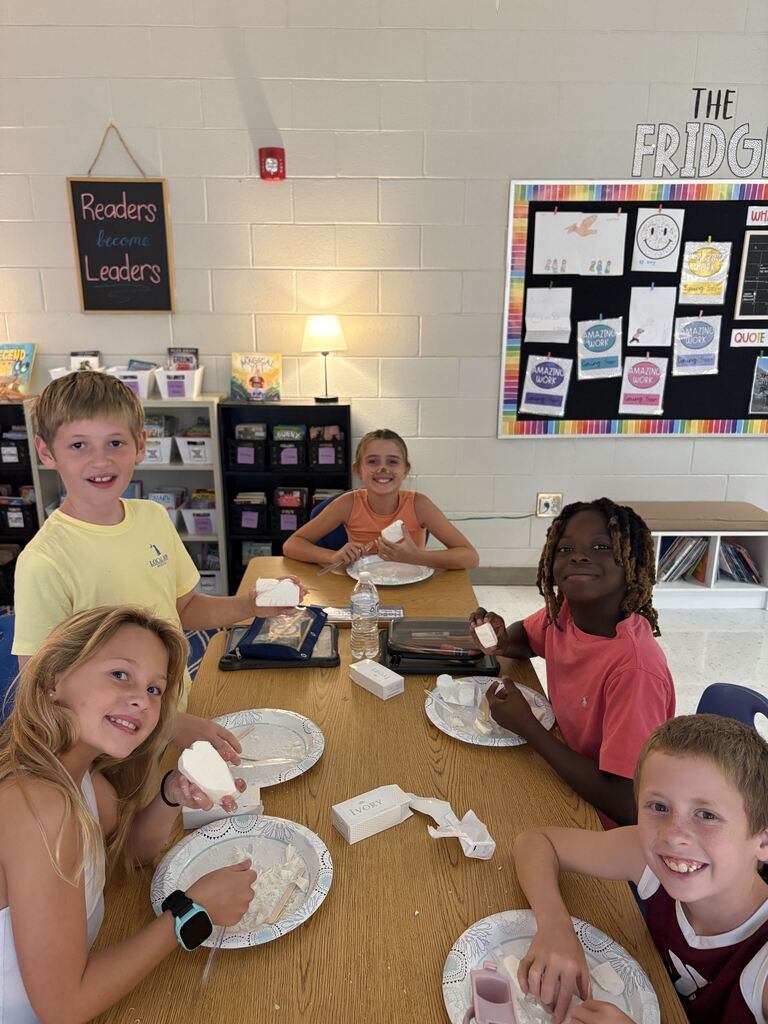 a group of students working on a project during tiger rising day