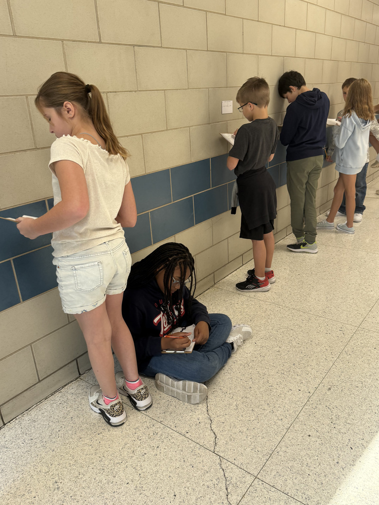 Who says math review can't be an adventure? Our 5th graders took their learning to the hallway for a gallery walk, working through task cards posted on the walls. This innovative method keeps students active and excited about reinforcing their math skills. It's awesome to see them so focused and ready to learn!