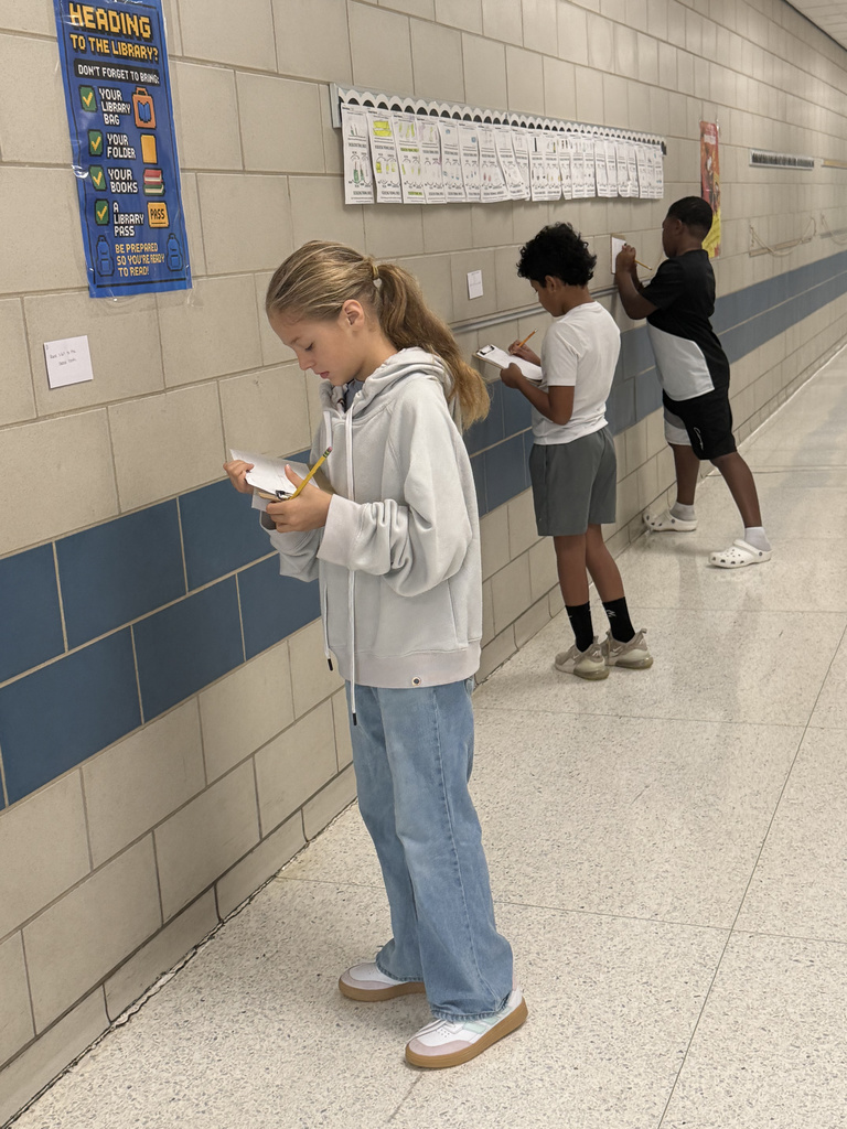 Who says math review can't be an adventure? Our 5th graders took their learning to the hallway for a gallery walk, working through task cards posted on the walls. This innovative method keeps students active and excited about reinforcing their math skills. It's awesome to see them so focused and ready to learn!