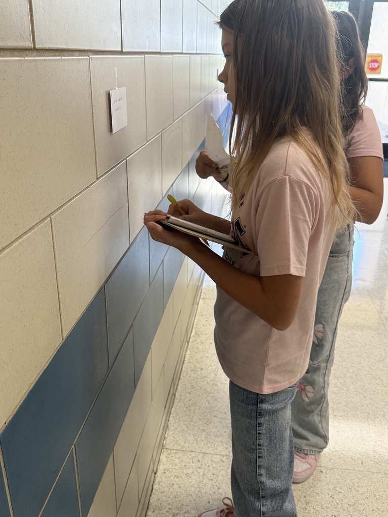 Who says math review can't be an adventure? Our 5th graders took their learning to the hallway for a gallery walk, working through task cards posted on the walls. This innovative method keeps students active and excited about reinforcing their math skills. It's awesome to see them so focused and ready to learn!
