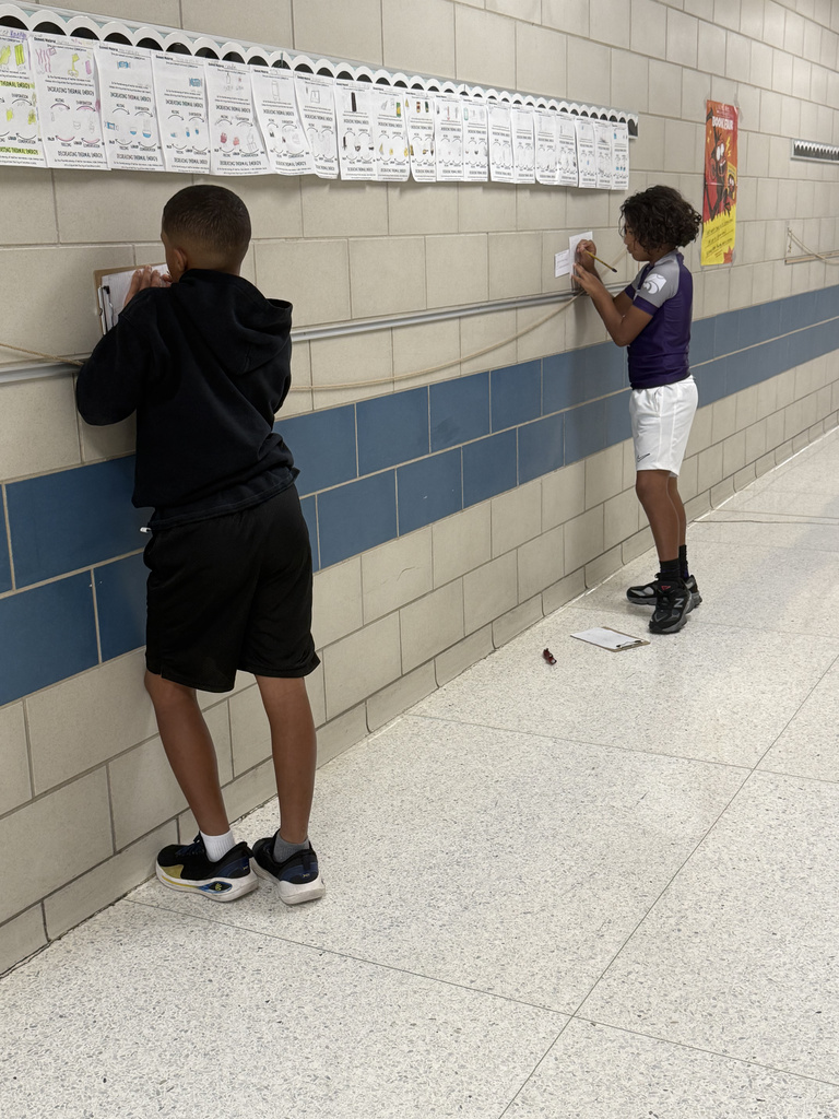Who says math review can't be an adventure? Our 5th graders took their learning to the hallway for a gallery walk, working through task cards posted on the walls. This innovative method keeps students active and excited about reinforcing their math skills. It's awesome to see them so focused and ready to learn!