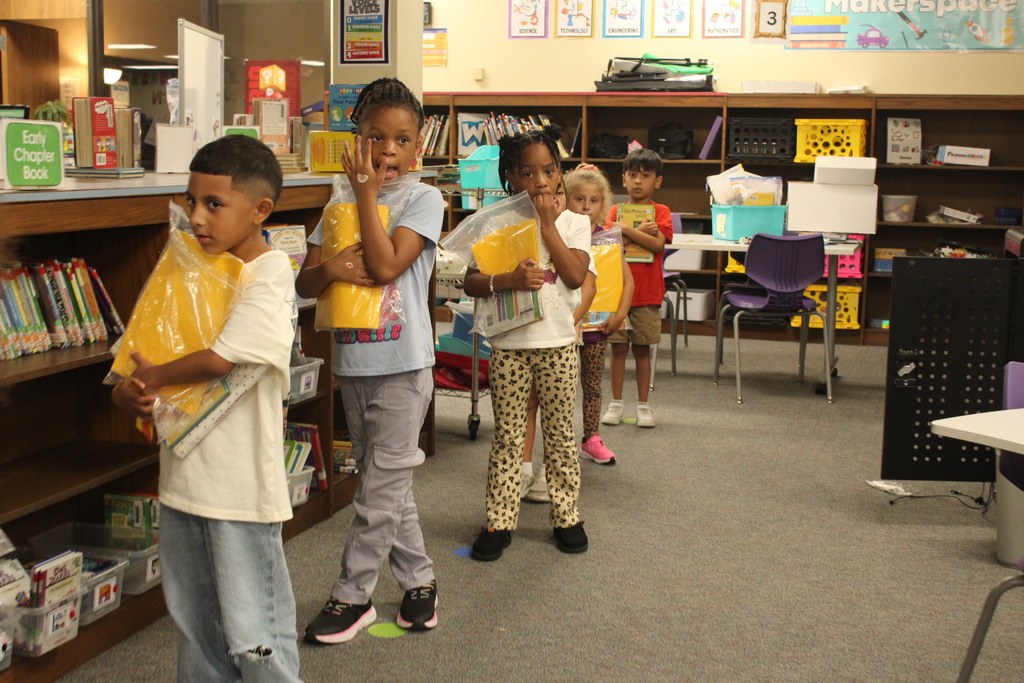 It's a great day to find a new story! Mrs. Aleman's first grade students are finding their own books and settling in to read. These are the moments where a love for reading begins to grow! #ReadersAreLeaders #SchoolLife #Bookworm