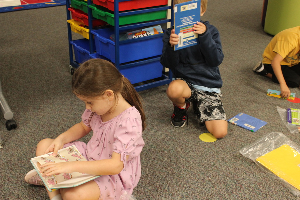 It's a great day to find a new story! Mrs. Aleman's first grade students are finding their own books and settling in to read. These are the moments where a love for reading begins to grow! #ReadersAreLeaders #SchoolLife #Bookworm