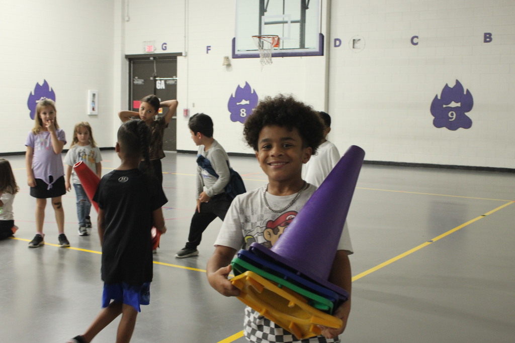 Look at these smiles! Our students were having a great time in P.E. with Coach Braun and Coach Perez. They were focused and having a blast with a game called "Guard the Castle." What a fantastic way to end the week! #PhysicalEducation #FunAtSchool #HappyKids