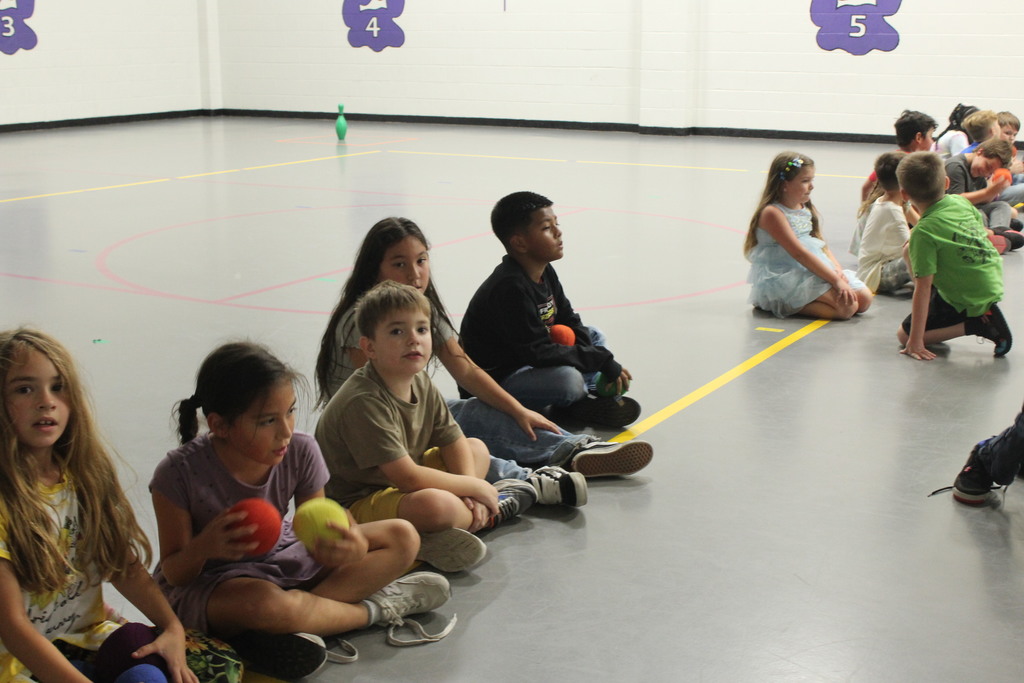 Look at these smiles! Our students were having a great time in P.E. with Coach Braun and Coach Perez. They were focused and having a blast with a game called "Guard the Castle." What a fantastic way to end the week! #PhysicalEducation #FunAtSchool #HappyKids
