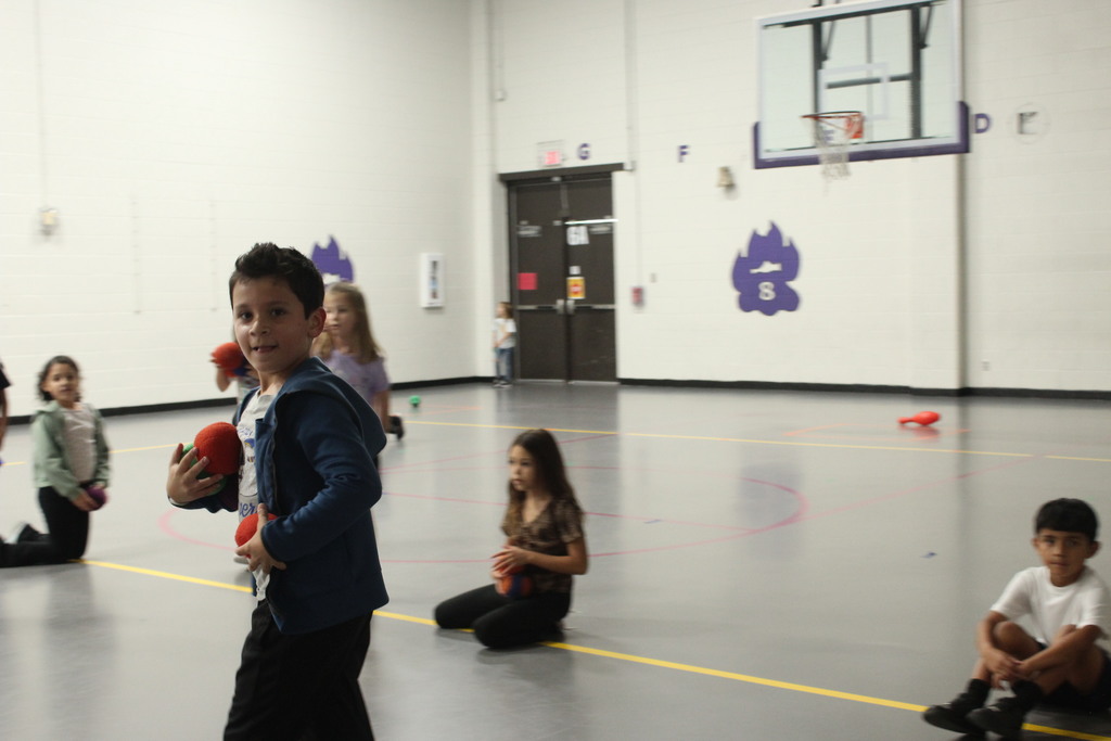Look at these smiles! Our students were having a great time in P.E. with Coach Braun and Coach Perez. They were focused and having a blast with a game called "Guard the Castle." What a fantastic way to end the week! #PhysicalEducation #FunAtSchool #HappyKids