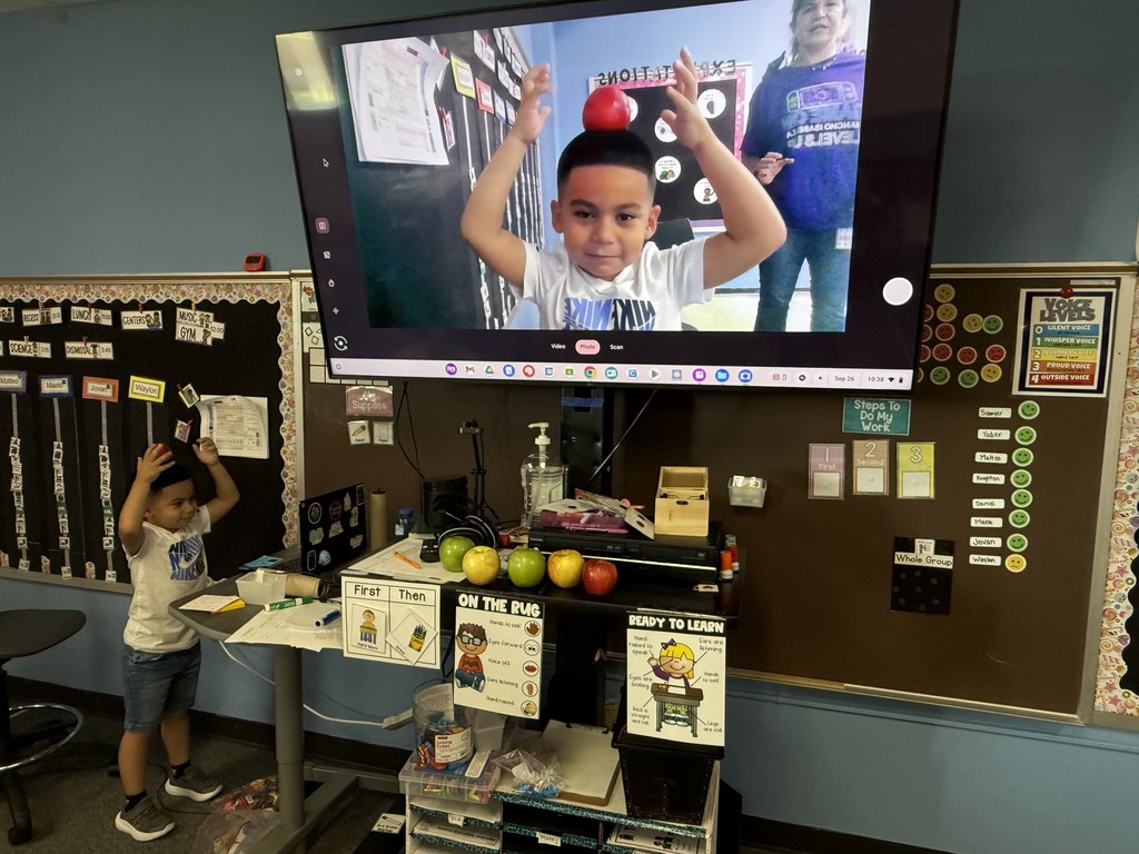 How do you celebrate Johnny Appleseed Day? With an apple on your head, of course! Mrs. Counts' class is crushing this challenge and making learning memorable. We love seeing all the great things happening in our classrooms! #DailyGreatness #SchoolSpirit #KindergartenRocks #AppleChallenge #CommunityInvolved