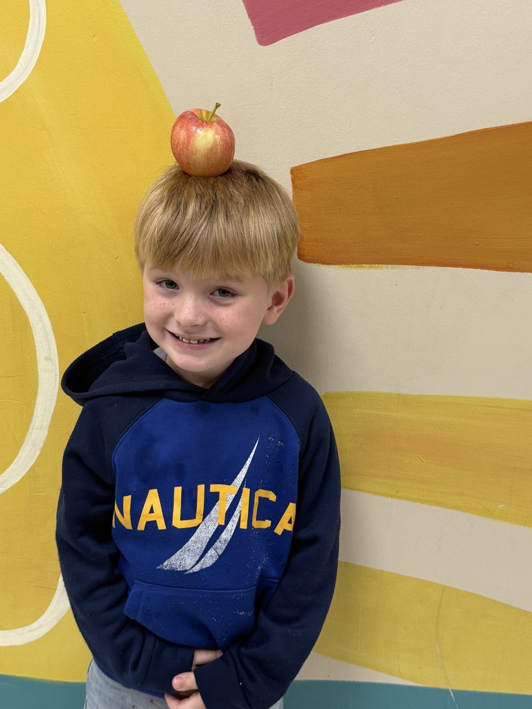 How do you celebrate Johnny Appleseed Day? With an apple on your head, of course! Mrs. Counts' class is crushing this challenge and making learning memorable. We love seeing all the great things happening in our classrooms! #DailyGreatness #SchoolSpirit #KindergartenRocks #AppleChallenge #CommunityInvolved
