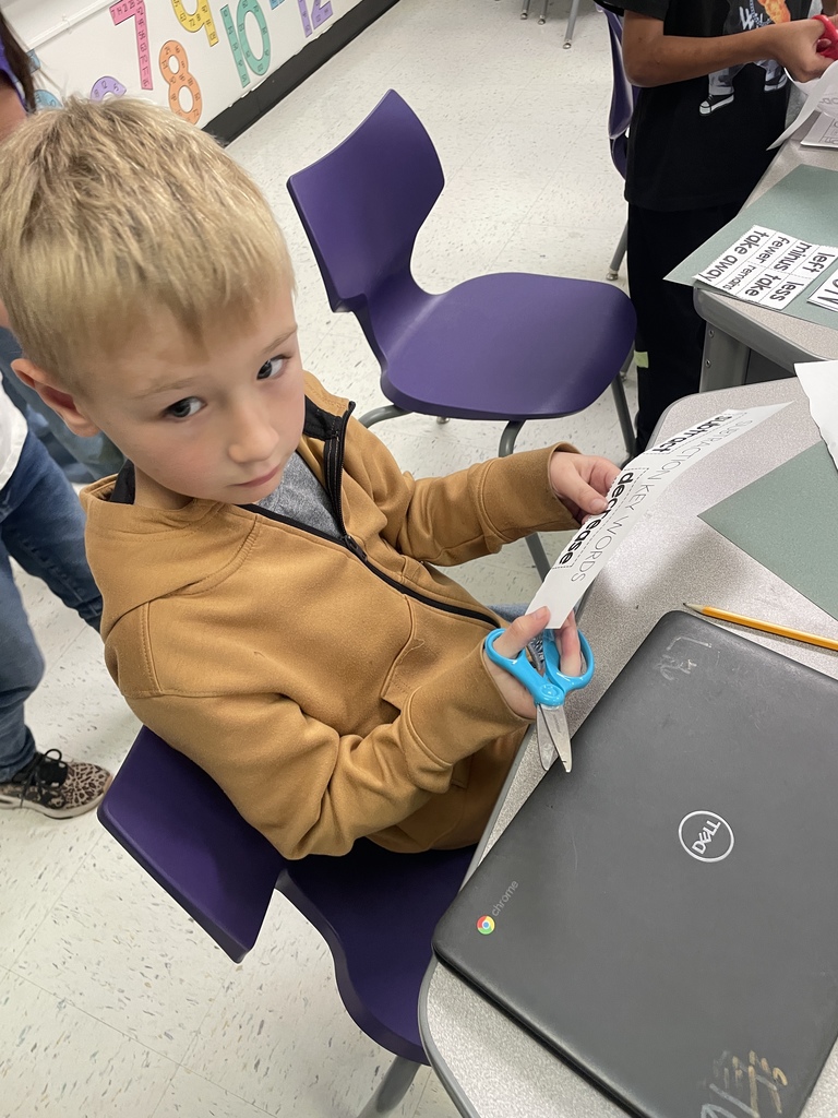 Our fantastic 2nd graders are building a strong foundation in math by getting hands on with vocabulary practice. They were cutting and sorting key words like 'subtract,' 'decrease,' and 'plus,' making abstract concepts concrete and memorable. We love seeing this level of focus and engagement in the classroom every day!