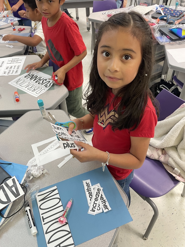 Our fantastic 2nd graders are building a strong foundation in math by getting hands on with vocabulary practice. They were cutting and sorting key words like 'subtract,' 'decrease,' and 'plus,' making abstract concepts concrete and memorable. We love seeing this level of focus and engagement in the classroom every day!
