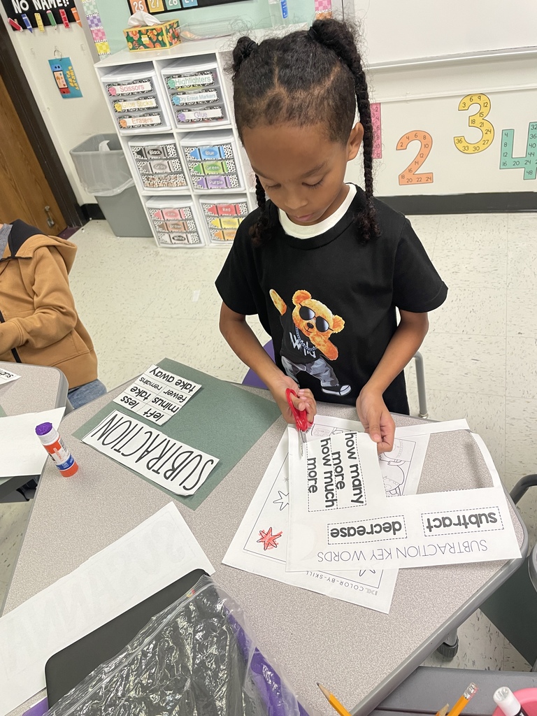Our fantastic 2nd graders are building a strong foundation in math by getting hands on with vocabulary practice. They were cutting and sorting key words like 'subtract,' 'decrease,' and 'plus,' making abstract concepts concrete and memorable. We love seeing this level of focus and engagement in the classroom every day!