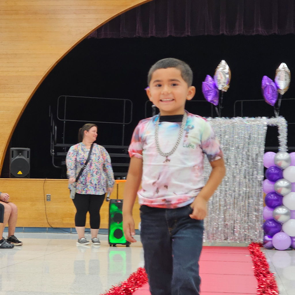 Learning comes to life in Pre-K! Their recent Clothing Unit culminated in a fabulous Fashion Show, reinforcing everything from sorting by color and texture to developing essential self-help skills like buttoning and zipping.  Our students got to put their vocabulary and classification skills into action as they became designers and models for the day. A huge shoutout to our students for their creativity and our amazing teachers for making learning so tangible!