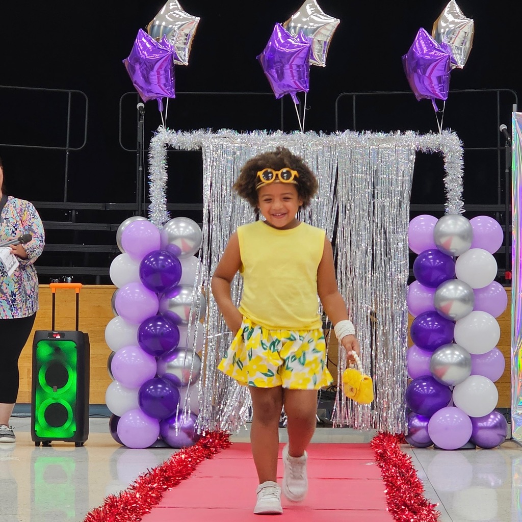 Learning comes to life in Pre-K! Their recent Clothing Unit culminated in a fabulous Fashion Show, reinforcing everything from sorting by color and texture to developing essential self-help skills like buttoning and zipping.  Our students got to put their vocabulary and classification skills into action as they became designers and models for the day. A huge shoutout to our students for their creativity and our amazing teachers for making learning so tangible!