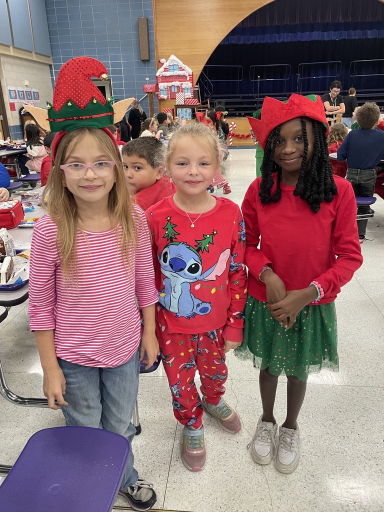 "Selfie with an Elfie! Our halls are officially under elf surveillance today! From sparkly sequins to striped socks, our students and staff definitely understood the assignment. We love seeing so much creativity and joy walking through the school!  Reminder: Don't forget that tomorrow is Rudolph/Reindeer Day!