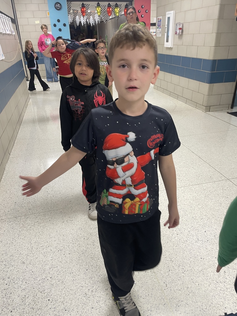 From "Team Nice" to "Team Naughty" (and a few Grinches in between! ), we saw it all today! The students looked fantastic for Favorite Holiday Shirt Day. We love days like this that bring our school community together with a little extra joy.  Tomorrow's Mission: Let’s get tacky! Tomorrow is Ugly Christmas Sweater Day. The uglier, the better! 