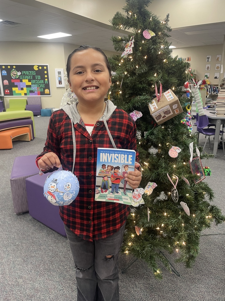 Spreading holiday cheer and a love for reading! We had such a blast with our Library Ornament Contest this year. Congratulations to our five amazing winners who each got to choose a brand-new book to keep! Just look at those smiles—nothing beats finding your next great read. A big thank you to all the students who participated and shared their creativity!