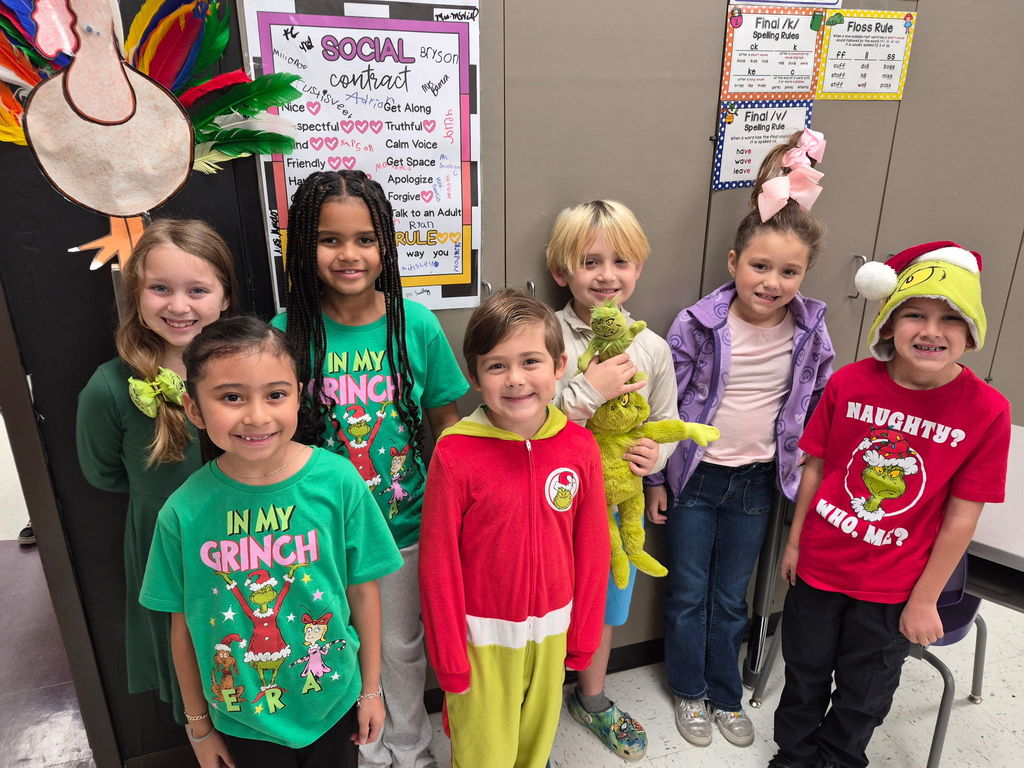 Grinch Day Shenanigans!  It looks like the Grinch's heart didn't shrink after all, because our students brought so much cheer to the school today! We had a fantastic time celebrating Grinch Day with so many creative shirts and costumes. Seeing all these smiles brightens our whole town!  Keeping the holiday spirit rolling:  Monday: Wear your favorite holiday shirt!  Tuesday: Candy Cane Day! Rock your red and white!  We love sharing moments like these that show the great things happening daily in our halls!