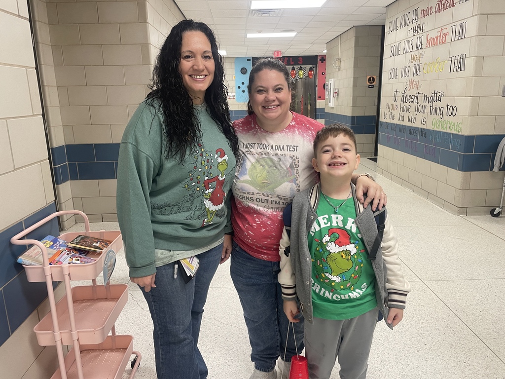 Grinch Day Shenanigans!  It looks like the Grinch's heart didn't shrink after all, because our students brought so much cheer to the school today! We had a fantastic time celebrating Grinch Day with so many creative shirts and costumes. Seeing all these smiles brightens our whole town!  Keeping the holiday spirit rolling:  Monday: Wear your favorite holiday shirt!  Tuesday: Candy Cane Day! Rock your red and white!  We love sharing moments like these that show the great things happening daily in our halls!