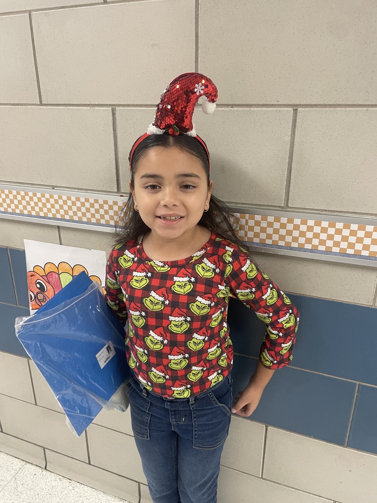 Grinch Day Shenanigans!  It looks like the Grinch's heart didn't shrink after all, because our students brought so much cheer to the school today! We had a fantastic time celebrating Grinch Day with so many creative shirts and costumes. Seeing all these smiles brightens our whole town!  Keeping the holiday spirit rolling:  Monday: Wear your favorite holiday shirt!  Tuesday: Candy Cane Day! Rock your red and white!  We love sharing moments like these that show the great things happening daily in our halls!