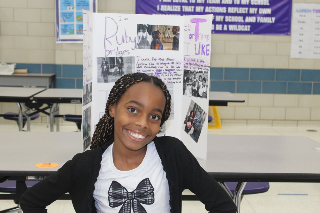 Our 5th graders transformed our cafeteria into a Living Wax Museum today in honor of Black History Month.  Visitors had to find the "magic button" at each station to bring these historical icons to life. Once "activated," students stepped out of their wax-like poses to share powerful stories—in character!—about leaders like John Lewis, Ruby Bridges, and Malcolm X.  Seeing our students take such pride in their research and public speaking was the highlight of our week! 🌟