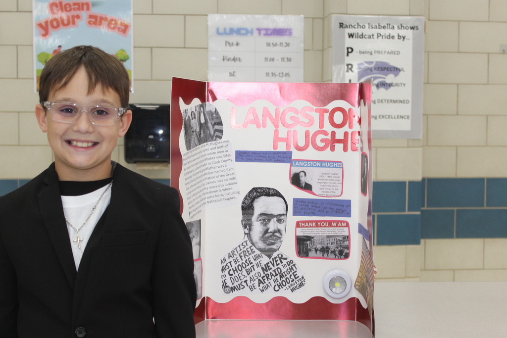 Our 5th graders transformed our cafeteria into a Living Wax Museum today in honor of Black History Month.  Visitors had to find the "magic button" at each station to bring these historical icons to life. Once "activated," students stepped out of their wax-like poses to share powerful stories—in character!—about leaders like John Lewis, Ruby Bridges, and Malcolm X.  Seeing our students take such pride in their research and public speaking was the highlight of our week! 🌟