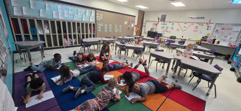 Finding the perfect "work zone!" Mrs. Arias' students got to choose their favorite spot to dive into their writing. Desk or floor? As long as we’re learning, there’s no wrong answer! We love seeing our students find their "comfy spot" to let their creativity flow. Which one would you choose? 